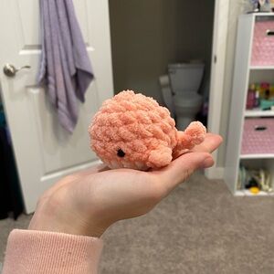 Mini coral crocheted whale